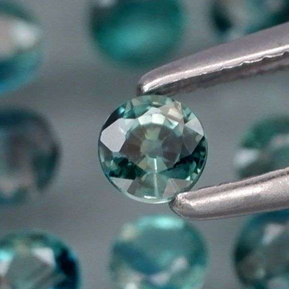 Heated only! 4.22ct greenish blue Sapphire set!