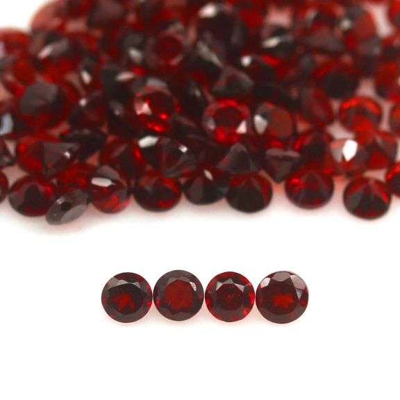 Outstanding 12.24ct diamond cut high fire Mozambique Garnet set