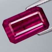 Woah! It's a 4.09ct midnight PINK Rhodolite Garnet!