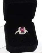 14kt White gold 1.65ct emerald cut tourmaline and diamond halo ring