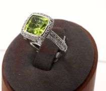 18kt White gold 3.14ct Peridot with 0.66ctw pave diamond halo and shank