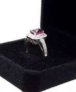 14kt White gold 1.65ct emerald cut tourmaline and diamond halo ring