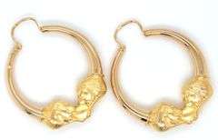 18ktt Yellow gold double lions head hoop earrings