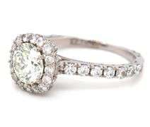 18kt White gold Tacori 1ct round brilliant cut and 0.65ctw diamond halo engagement ring