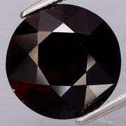 This 8.73ct Mozambique Garnet solitaire is HUGE!!!