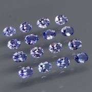 Heavy flashing! Untreated! 2.90ct oval cut Tanzanite set