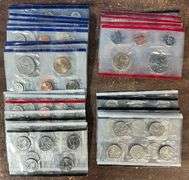 Assortment of mixed BU Mints Sets from 1999 to 2003 in cellophane. 145 BU coins total