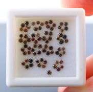Stunning 1.04ct parcel of Burgundy red diamonds