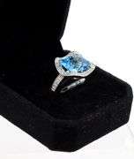18kt White gold blue topaz and diamond cocktail ring