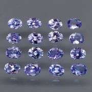 Heavy flashing 2.85ct oval cut Tanzanite set