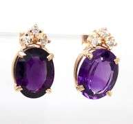 14kt Yellow gold oval amethyst and diamond stud earrings