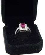 14kt White gold 1.65ct emerald cut tourmaline and diamond halo ring