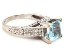 Modern 14K WG Blue Topaz Ring