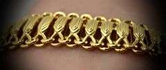 Fascinatingly Designed 14K Yellow Gold Wide Bracelet