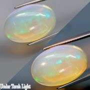 Gorgeous green and indigo flashing 11.66ct Jelly Opal