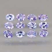 Heavy flashing 2.06ct oval cut Tanzanite set