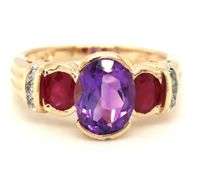 14kt Yellow gold oval amethyst, ruby and diamond accent 3 stone ring
