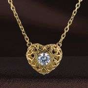 Beautiful Heart pendant in solid sterling silver with center stone dancing