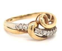 10kt Yellow gold diamond cross over ring