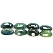 Heated only! 9.60ct blue green Sapphire set
