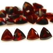 Stunning 10.86ct trillion cut cherry red Garnet set