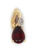 Set of 10kt yellow gold garnet ring and pendant