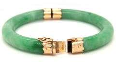 Green Jade hinged bangle bracelet in yellow gold