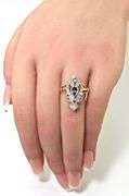 Feminine 14K Yellow Gold Ring with Pear Shaped Tanzanite