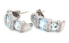 14kt White gold 2.50ctw aquamarine and diamond accent earrings