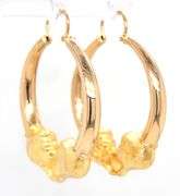 18ktt Yellow gold double lions head hoop earrings