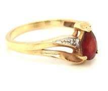 Set of 10kt yellow gold garnet ring and pendant