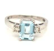14kt White gold 1.45ct Emerald cut Aquamarine and 0.20ctw diamond ring