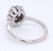 14kt White Gold oval Blue Star Sapphire and Diamond Halo Ring