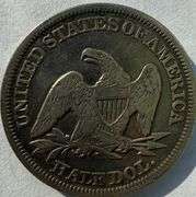 1855 Arrows Two Tone  Circulated Seated Half.