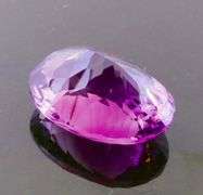 Amazing 21.73ct high fire concave cut pure Amethyst