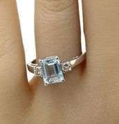 14kt White gold 1.45ct Emerald cut Aquamarine and 0.20ctw diamond ring