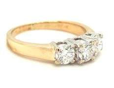 14kt Yellow gold 0.75ctw 3 stone diamond ring