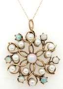 14kt Yellow gold opal and pearl knot pendant on chain