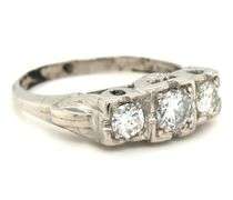 Vintage style 3 stone diamond ring in Platinum
