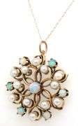 14kt Yellow gold opal and pearl knot pendant on chain