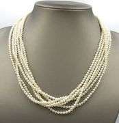 Multi strand pearl necklace with yellow gold clasp