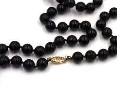 Set of black onyx beaded necklace, bracelet and stud