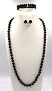 Set of black onyx beaded necklace, bracelet and stud