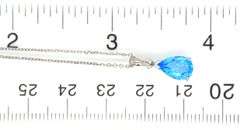 14kt White gold pear shaped blue topaz pendant on chain necklace