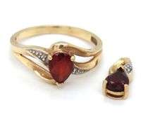 Set of 10kt yellow gold garnet ring and pendant