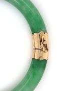 Green Jade hinged bangle bracelet in yellow gold