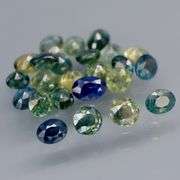 Heated only! 6.80ct mixed cut blue green Sapphire set