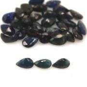 Beautifully colored 9.75ct ink blue Sapphire set