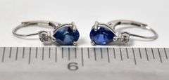 Elegant 14K White Gold Synthetic Blue Sapphire Gemstone and Diamond Dangle Earrings