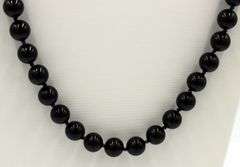 Set of black onyx beaded necklace, bracelet and stud